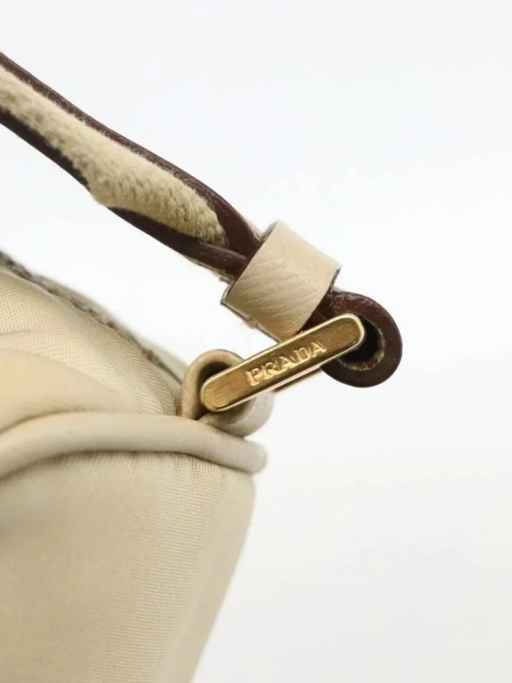 Prada brand	prada color	beige